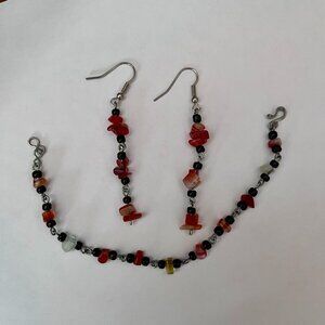 beaded black and orange/pink bracelet and earring set